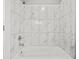 Clean bathroom with marble tile shower and bathtub at 1218 N Grant Ave, Indianapolis, IN 46201