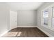 Empty bedroom with wood floor and neutral walls at 1218 N Grant Ave, Indianapolis, IN 46201