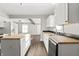 Modern kitchen with white cabinets and butcher block countertops at 1218 N Grant Ave, Indianapolis, IN 46201