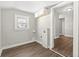 Laundry room with upper cabinets and flooring at 1218 N Grant Ave, Indianapolis, IN 46201