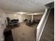 Spacious finished basement with a sitting area and office space at 1247 Dale Hollow Dr, Indianapolis, IN 46229