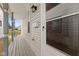 Front porch with gray siding and a wooden floor at 128 Wisconsin St, Indianapolis, IN 46225