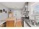 Kitchen with stainless steel appliances and butcher block island at 128 Wisconsin St, Indianapolis, IN 46225