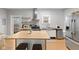 Updated kitchen featuring stainless steel appliances and an island at 128 Wisconsin St, Indianapolis, IN 46225