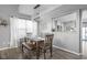 Bright dining room features a table with four chairs and a bench at 13830 Brightwater Dr, Fishers, IN 46038