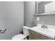 Small bathroom with vanity and toilet at 1418 S New Jersey St, Indianapolis, IN 46225