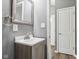 Small bathroom with vanity and view of entry at 1418 S New Jersey St, Indianapolis, IN 46225