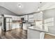 Modern kitchen with stainless steel appliances and white cabinets at 1418 S New Jersey St, Indianapolis, IN 46225