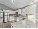 Modern kitchen with stainless steel appliances and white cabinets at 1418 S New Jersey St, Indianapolis, IN 46225