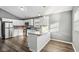 Modern kitchen with stainless steel appliances and white cabinets at 1418 S New Jersey St, Indianapolis, IN 46225