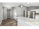 Modern kitchen with stainless steel appliances and white cabinets at 1418 S New Jersey St, Indianapolis, IN 46225