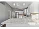 Modern kitchen with stainless steel appliances and white cabinets at 1418 S New Jersey St, Indianapolis, IN 46225