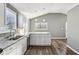 Modern kitchen with stainless steel appliances and white cabinets at 1418 S New Jersey St, Indianapolis, IN 46225