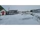 Driveway to farm buildings in a snowy landscape at 1545 S Us 421, Zionsville, IN 46077