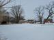 Ranch style home with detached barn and snow covered yard at 1545 S Us 421, Zionsville, IN 46077