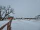 Open farmland with snow covered fields and leafless trees at 1545 S Us 421, Zionsville, IN 46077