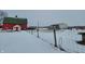 Red barn with green roof in snowy farm setting at 1545 S Us 421, Zionsville, IN 46077