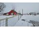 Picturesque red barn on a snowy farm setting at 1545 S Us 421, Zionsville, IN 46077