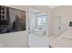 Bright bathroom featuring a standalone tub beneath a window for natural light at 15844 Nocturne Dr, Westfield, IN 46074