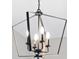 Contemporary chandelier features black metal framing and candelabra-style lights for modern elegance at 15844 Nocturne Dr, Westfield, IN 46074