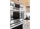 Stainless steel oven featuring digital controls and sleek design, enhancing the kitchen's modern aesthetic at 15844 Nocturne Dr, Westfield, IN 46074
