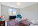 Bright playroom featuring a colorful rug, a play table, and comfortable beanbag chairs at 15844 Nocturne Dr, Westfield, IN 46074