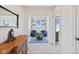 Sitting area featuring unique decor, stylish seating, and ample natural light from a nearby window at 15844 Nocturne Dr, Westfield, IN 46074