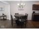 Cozy dining area with a round table and four chairs at 173 Megan Way, Cumberland, IN 46229
