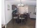 Dining area with table and chairs, kitchen and living room views at 173 Megan Way, Cumberland, IN 46229