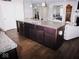 Modern kitchen with granite countertops and stainless steel appliances at 173 Megan Way, Cumberland, IN 46229