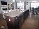 Modern kitchen with island and stainless steel appliances at 173 Megan Way, Cumberland, IN 46229