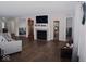 Spacious living room with hardwood floors, fireplace and built-ins at 173 Megan Way, Cumberland, IN 46229