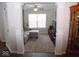 Living room with sectional sofa, large window, and carpet at 173 Megan Way, Cumberland, IN 46229