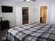 Main bedroom with king-size bed, TV, and bathroom access at 173 Megan Way, Cumberland, IN 46229
