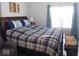 King-size bed in a bright and spacious main bedroom at 173 Megan Way, Cumberland, IN 46229