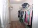Spacious walk-in closet with hanging rods and shelves at 173 Megan Way, Cumberland, IN 46229