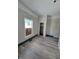 Spacious bedroom with new flooring and fresh paint at 1826 Tallman Ave, Indianapolis, IN 46218