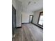 Large bedroom with new flooring and access to bathroom at 1826 Tallman Ave, Indianapolis, IN 46218