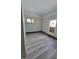Renovated bedroom featuring new flooring and fresh paint at 1826 Tallman Ave, Indianapolis, IN 46218