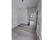 Renovated dining room with new flooring and wainscoting at 1826 Tallman Ave, Indianapolis, IN 46218