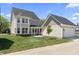 New backyard lawn, patio and landscaping with house and garage at 1833 Luther St, Indianapolis, IN 46203