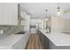 Stylish kitchen boasts stainless steel appliances, modern backsplash, and pendant lighting at 1833 Luther St, Indianapolis, IN 46203