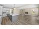 Modern kitchen with island, stainless steel appliances, and ample natural light at 1833 Luther St, Indianapolis, IN 46203