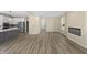 Open concept living space with a fireplace and modern kitchen at 1833 Luther St, Indianapolis, IN 46203