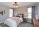 Comfortable bedroom with light gray walls, carpet, and windows for plenty of natural light at 1837 Luther St, Indianapolis, IN 46203