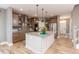 Spacious kitchen with a large island, stainless steel appliances, and wood floors at 1837 Luther St, Indianapolis, IN 46203