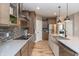 Modern kitchen with stainless appliances, an undermount sink, and mosaic backsplash at 1837 Luther St, Indianapolis, IN 46203
