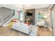Bright living room featuring modern lighting, stone fireplace, and stylish decor at 1837 Luther St, Indianapolis, IN 46203