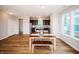 Dining room features a dining table and bench seats with an open-concept layout at 1841 Luther St, Indianapolis, IN 46203
