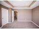 Spacious bedroom with tray ceilings, plush carpeting, and a walk-in closet at 1902 Zwingley St, Indianapolis, IN 46203